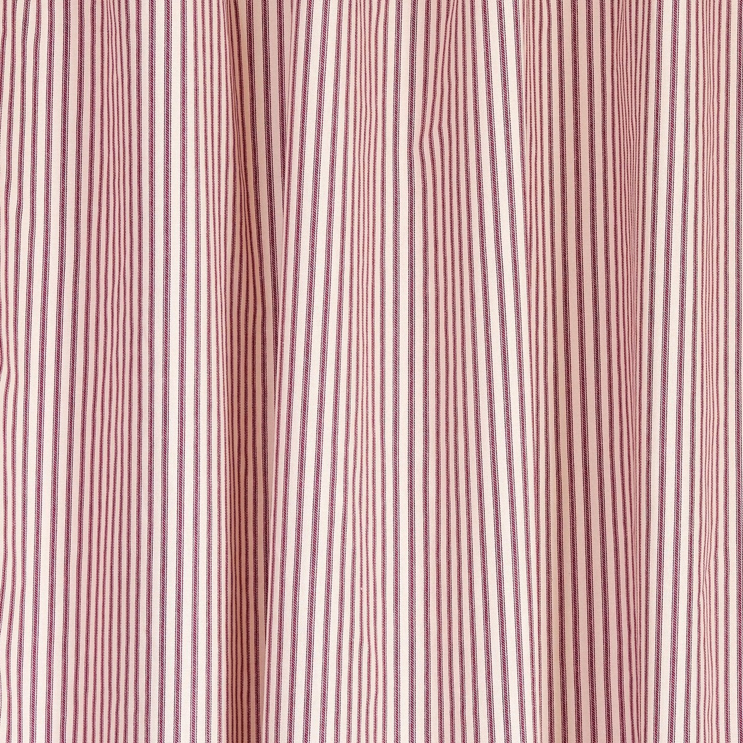 red ticking stripe fabric close up