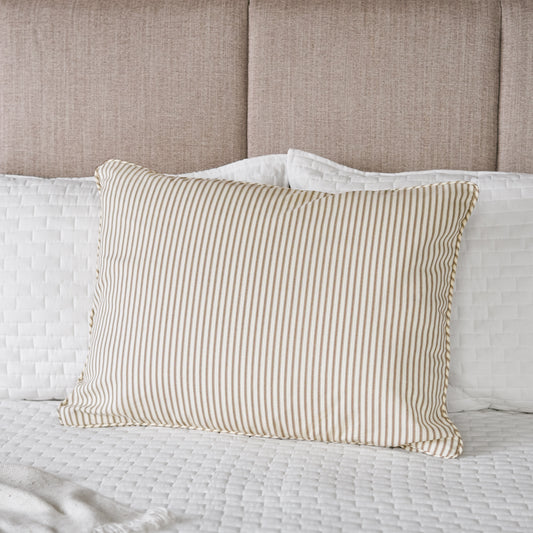 brown striped standard sham on bed