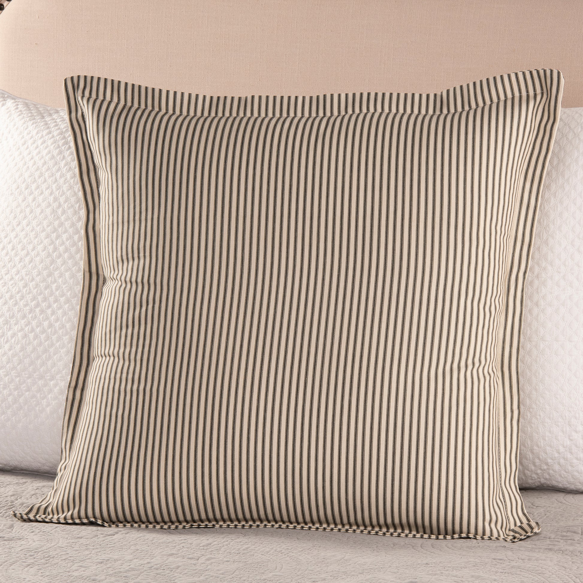 Black and cream ticking striped euro sham 26x26 on bed