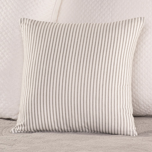 black and white ticking stripe throw pillow cover on bed