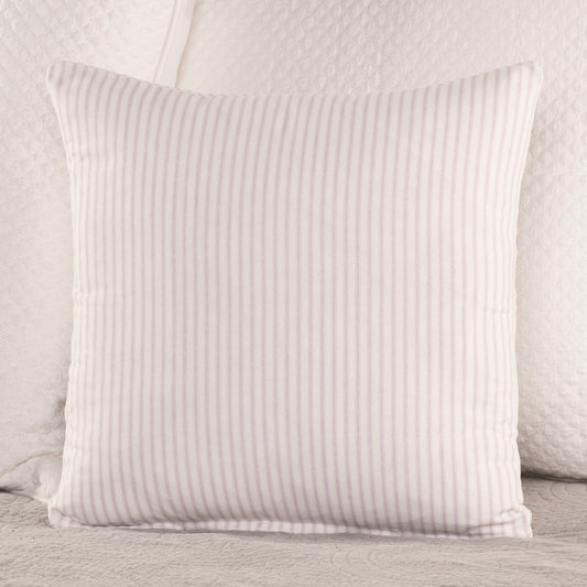 lavender and white ticking stripe throw pillow on bed