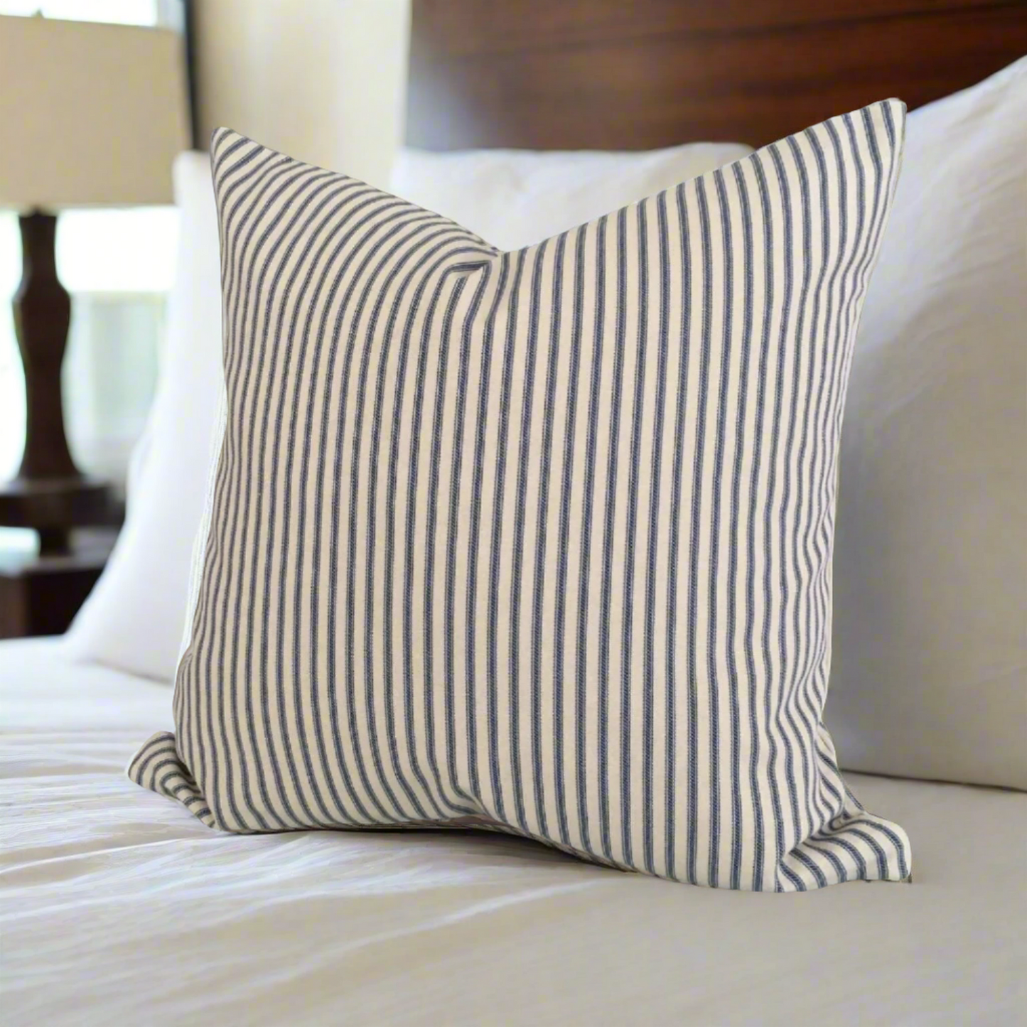 ticking stripe pillow sham on a bed